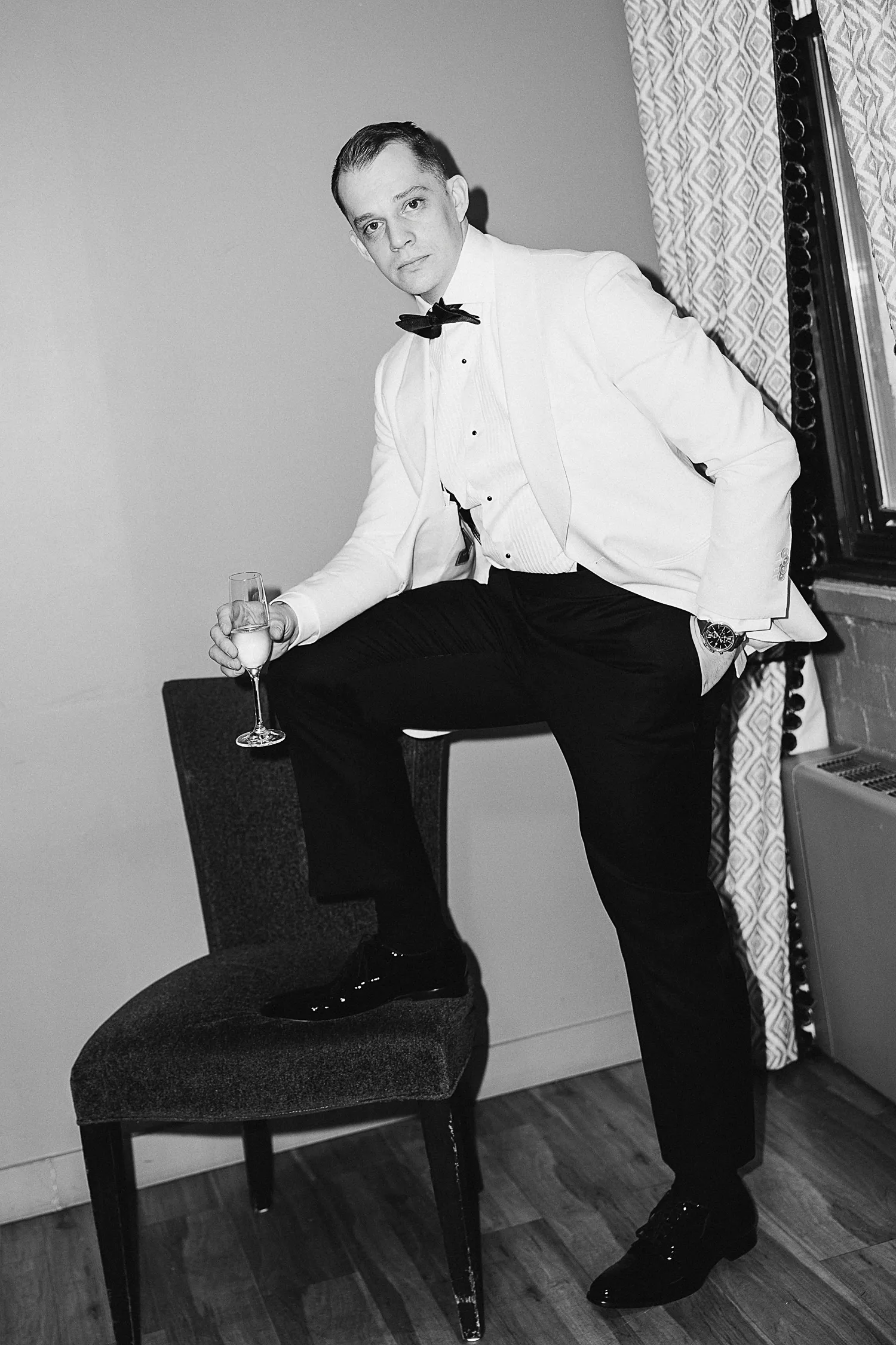 Editorial groom portrait at George Restaurant | Toronto