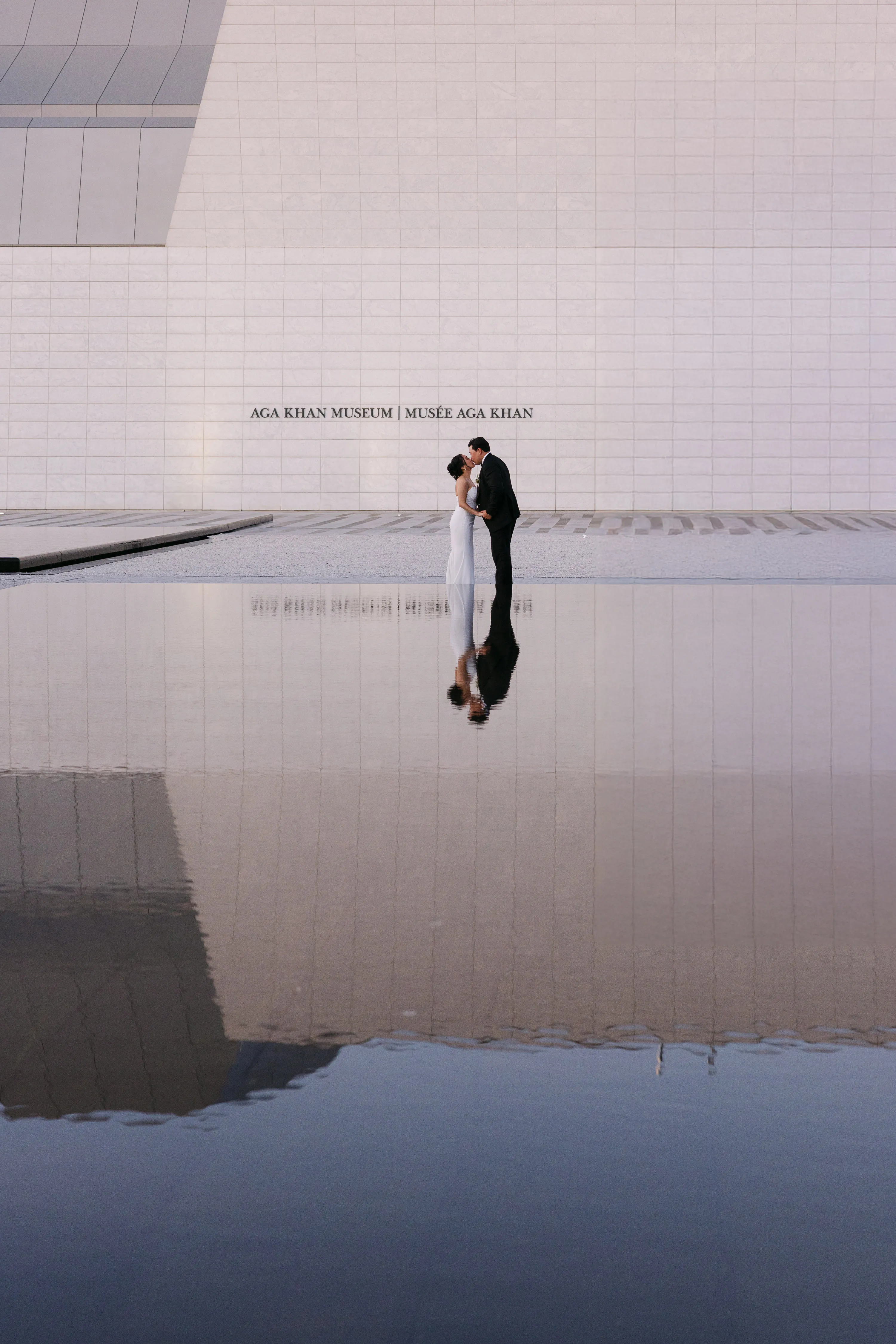 Couple portrait at Aga Khan reflecting pools