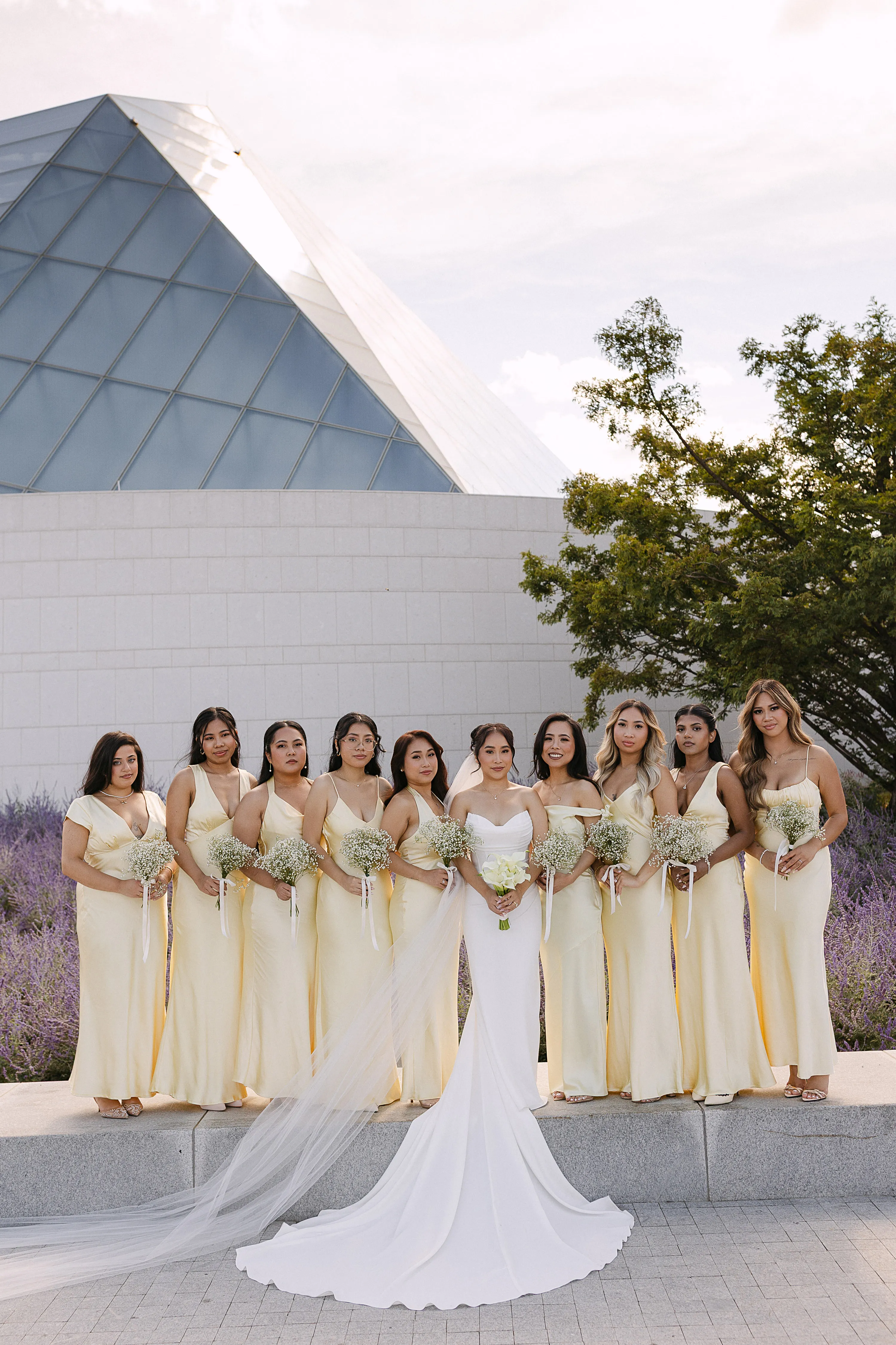Bride and groom at Aga Khan Museum reflecting pools