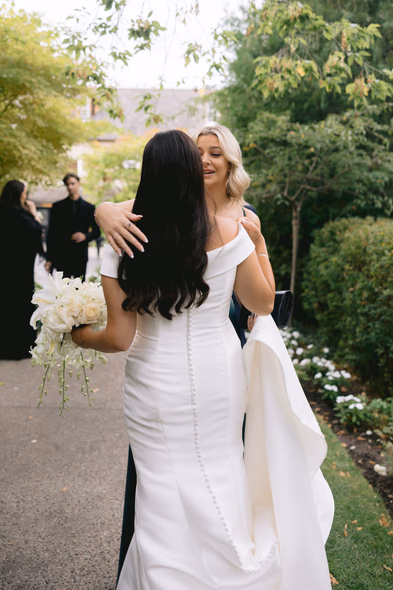 Ancaster Mill chapel wedding hug