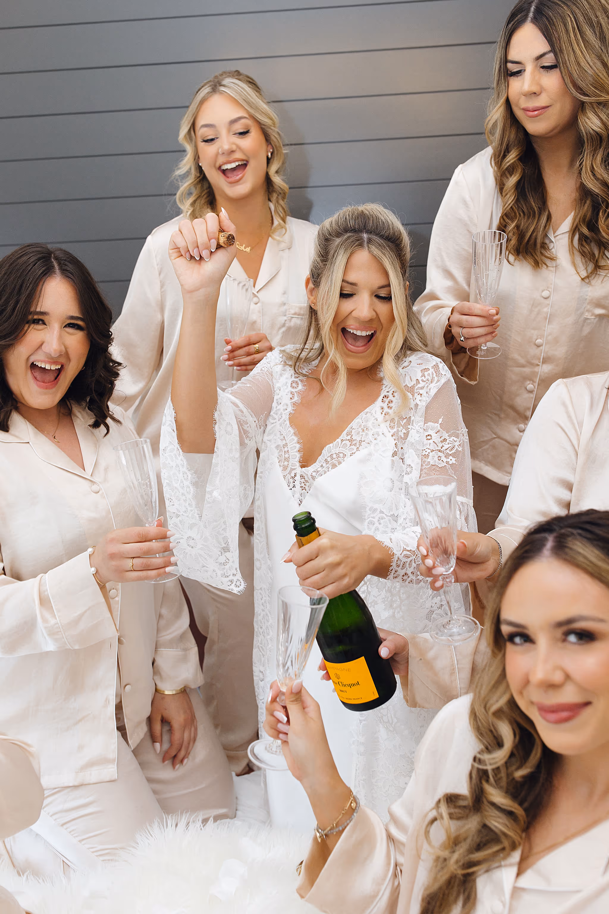 champaign moment with bridal party