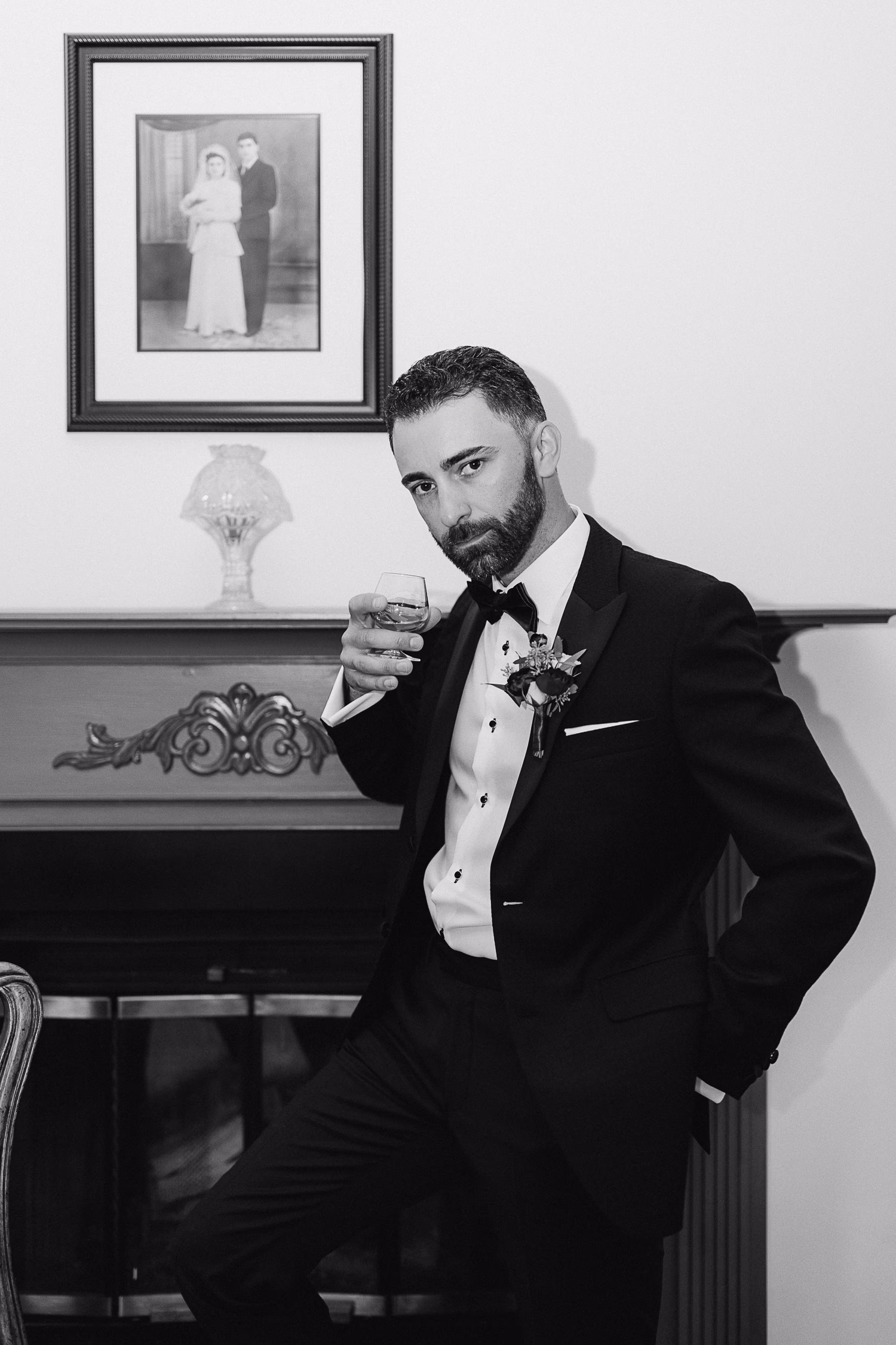 Fashion-led black and white groom portrait
