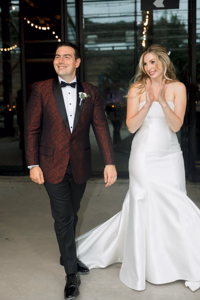 Bride and groom posing at Evergreen Brickworks