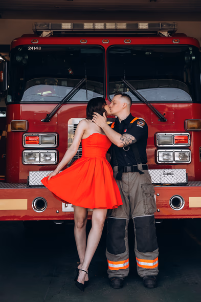 couple in firefighter uniforms