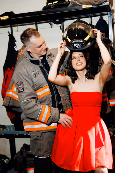 couple laughing at fire station