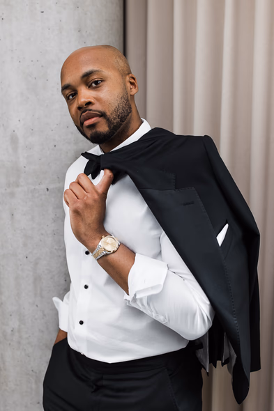 groom posing at Hotel X