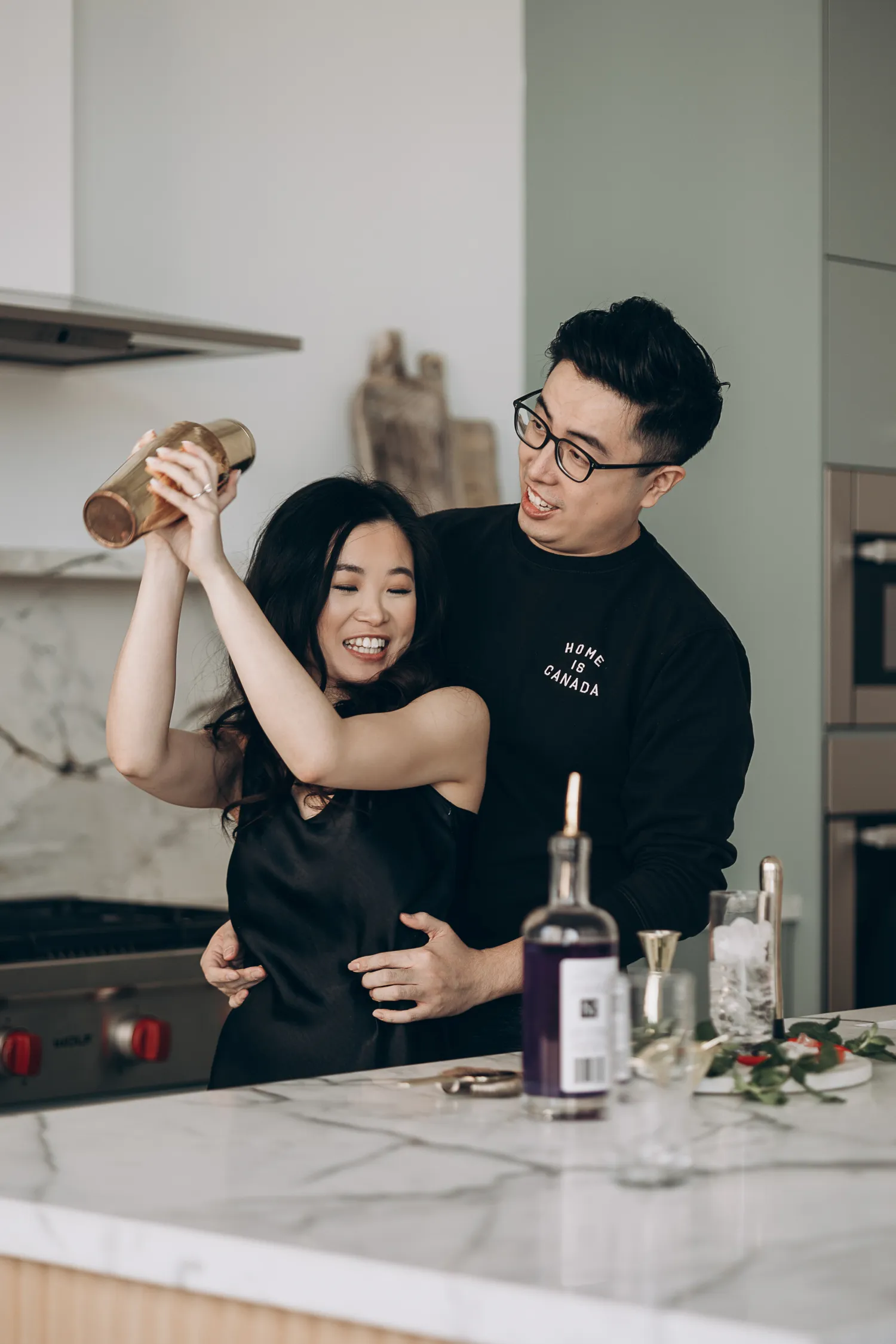 cooking engagement photo by Astora Studio
