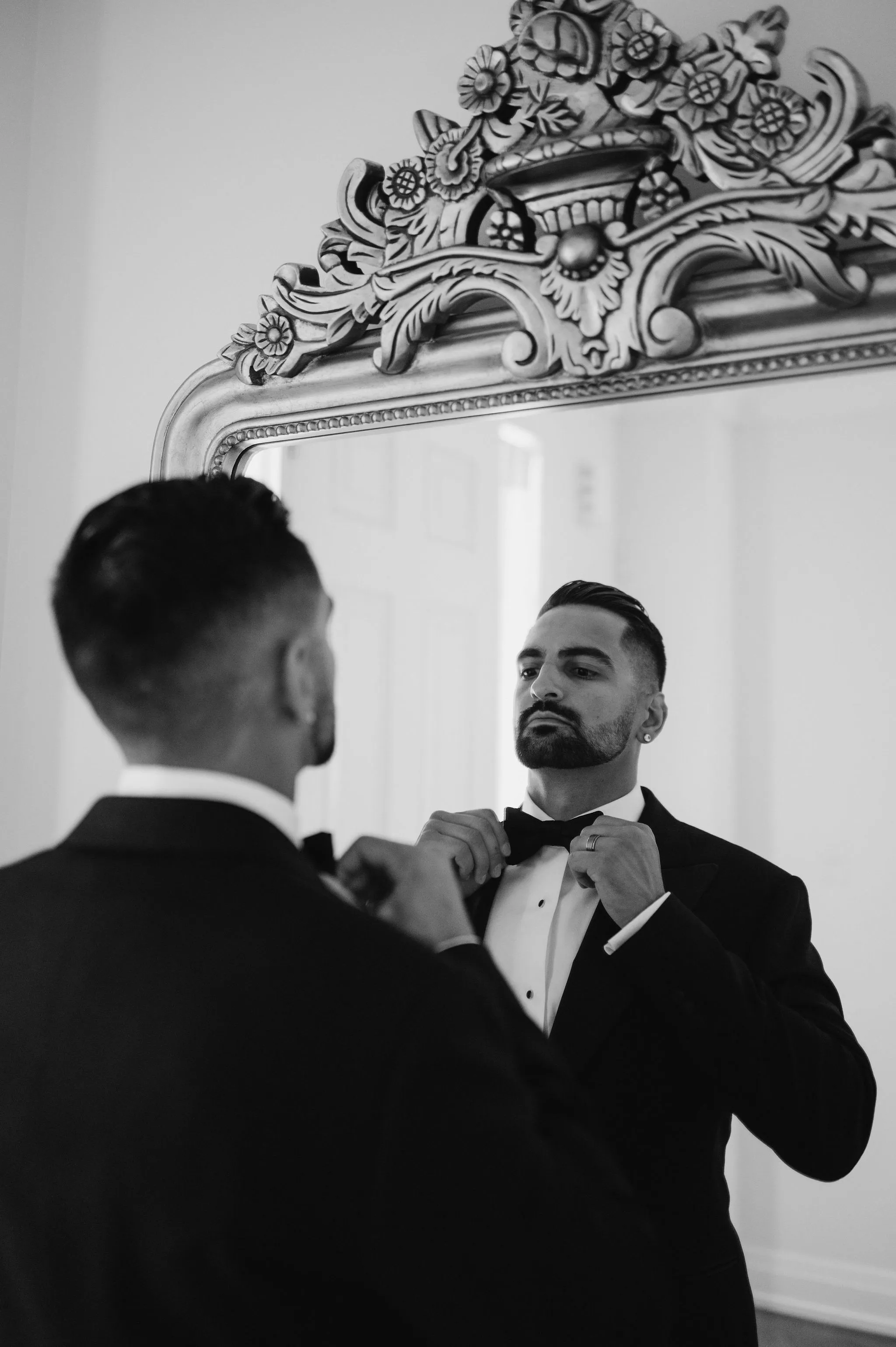 hotel groom getting ready portrait