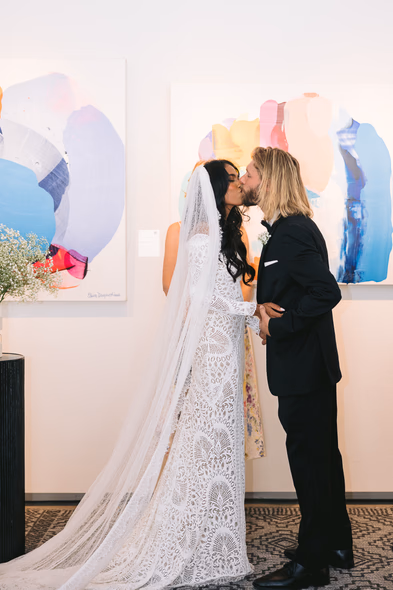 first kiss at Art Gallery of Ontario (AGO) wedding