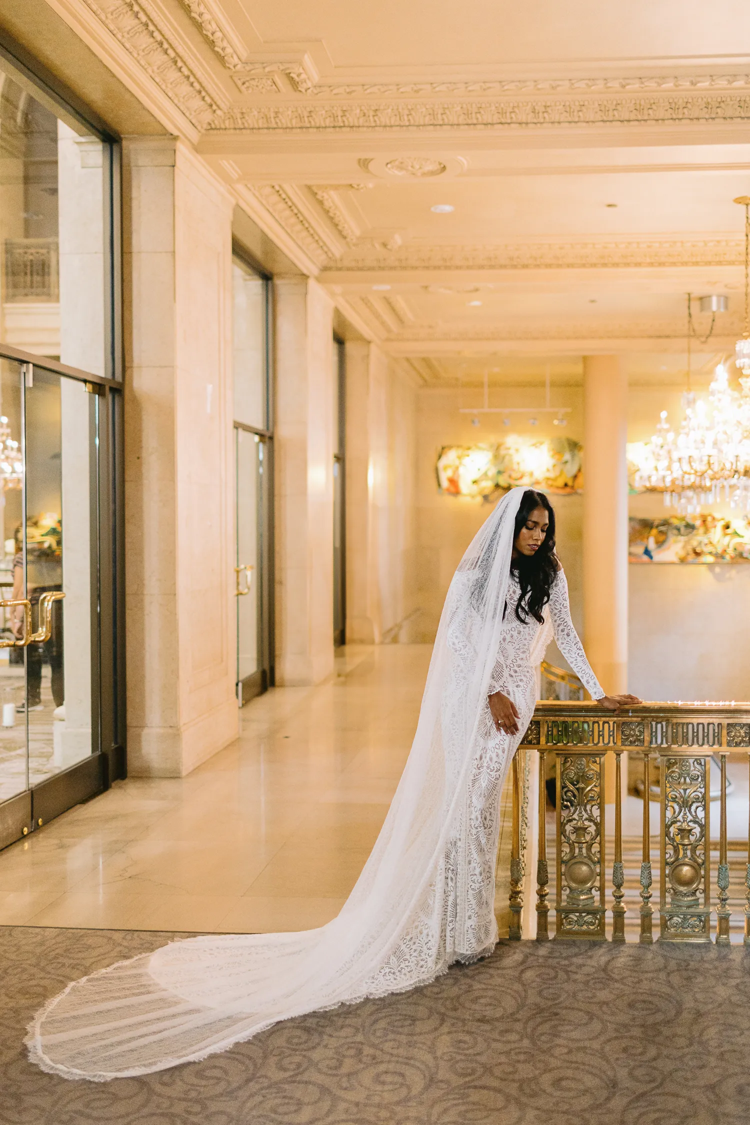 full-body portrait of the bride at One King West Hotel