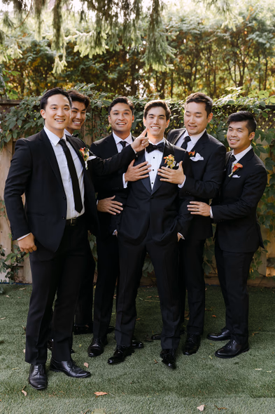 Groomsmen posing together