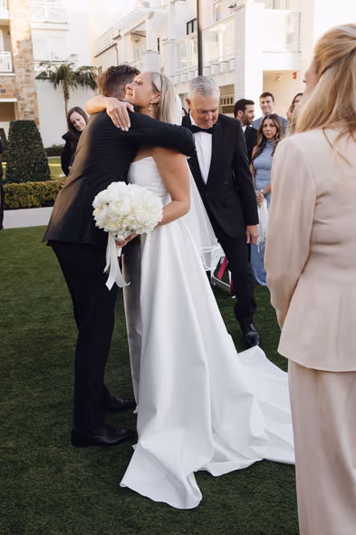 Bride hugging groom at Lido House wedding ceremony