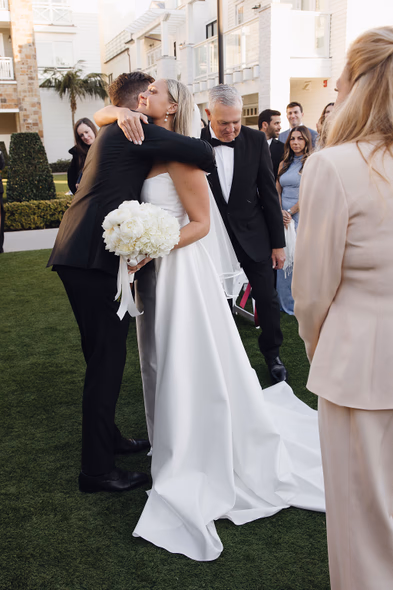 Bride hugging groom at Lido House wedding ceremony