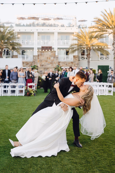 Bride and groom first dance in front of Lido House, Newport Beach