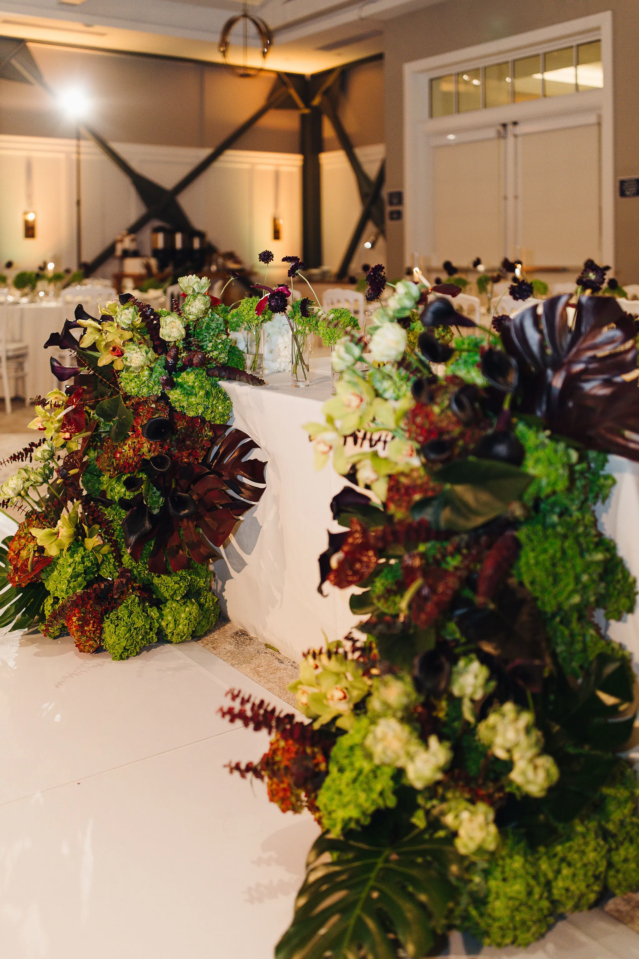 Elegant wedding reception setup with floral arrangements at Lido House