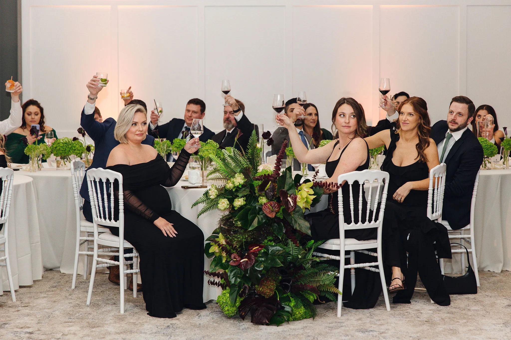 Group of wedding guests celebrating at Lido House