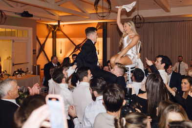 Bride and groom enjoying speeches at Lido House wedding reception