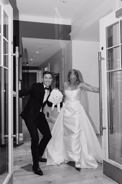Bride and groom making a grand entrance to their reception at Lido House