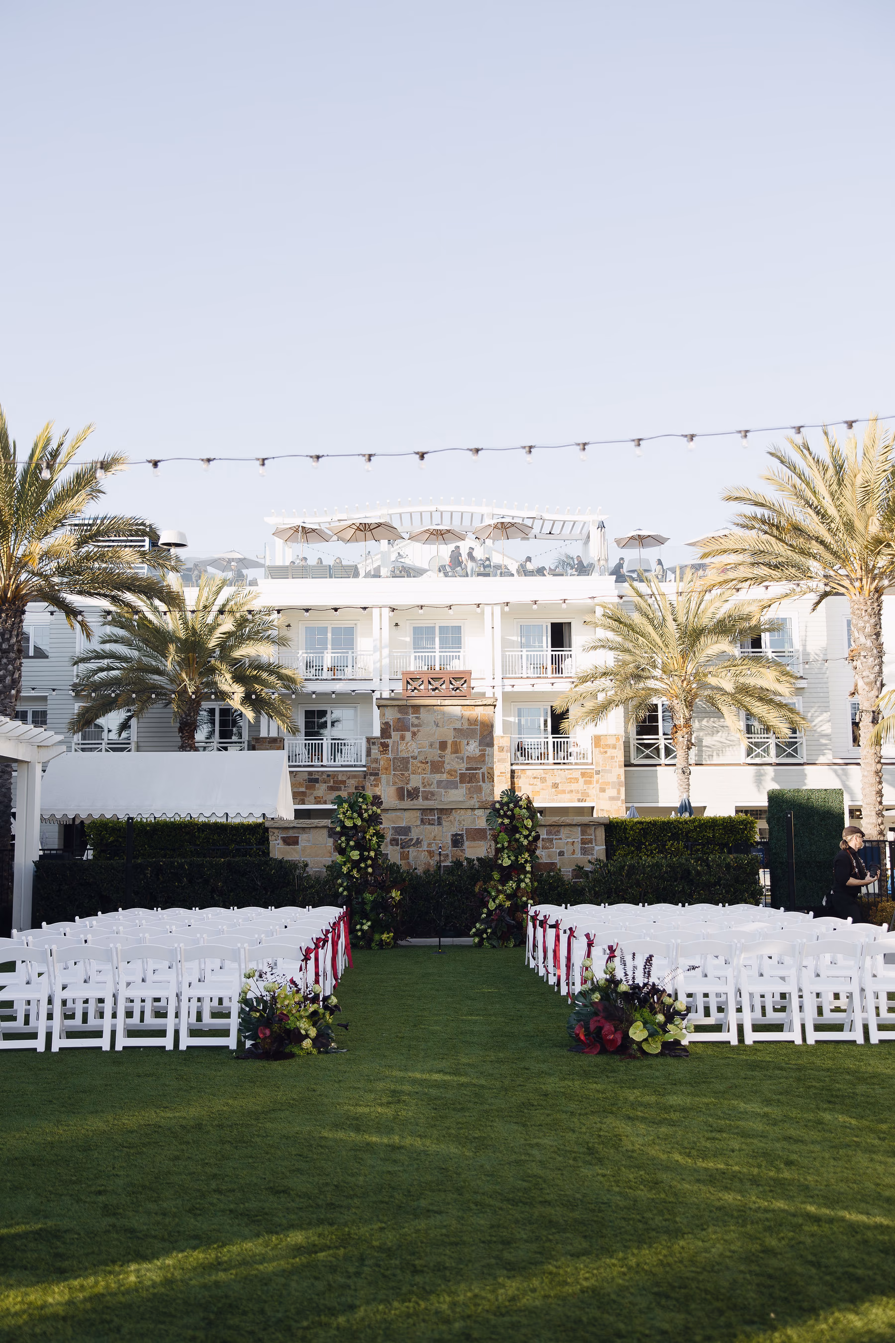 Bride walking down the aisle with her father at Lido House wedding