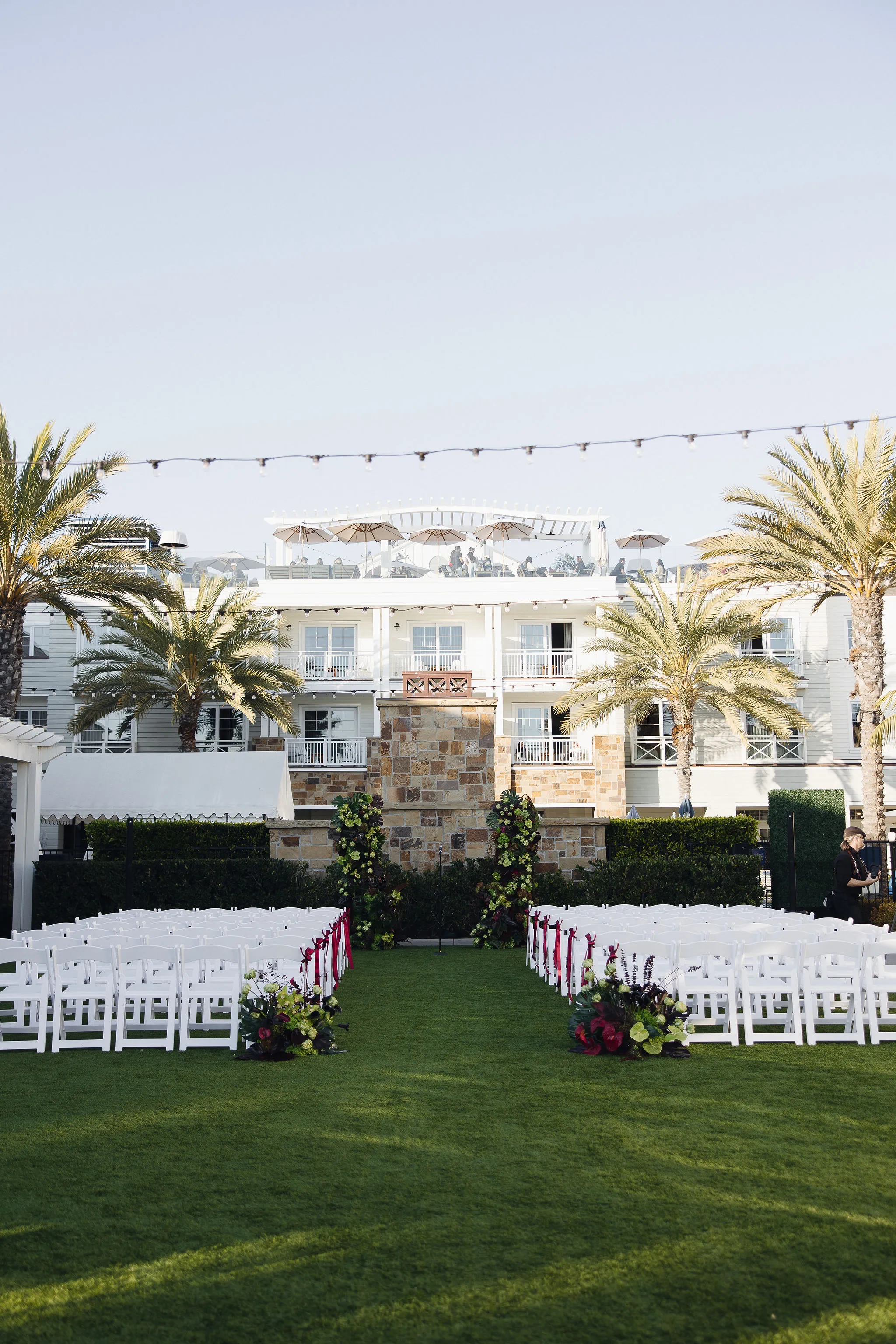 Bride walking down the aisle with her father at Lido House wedding