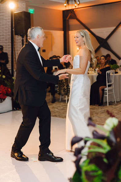 Bride dancing with a guest at Lido House wedding reception