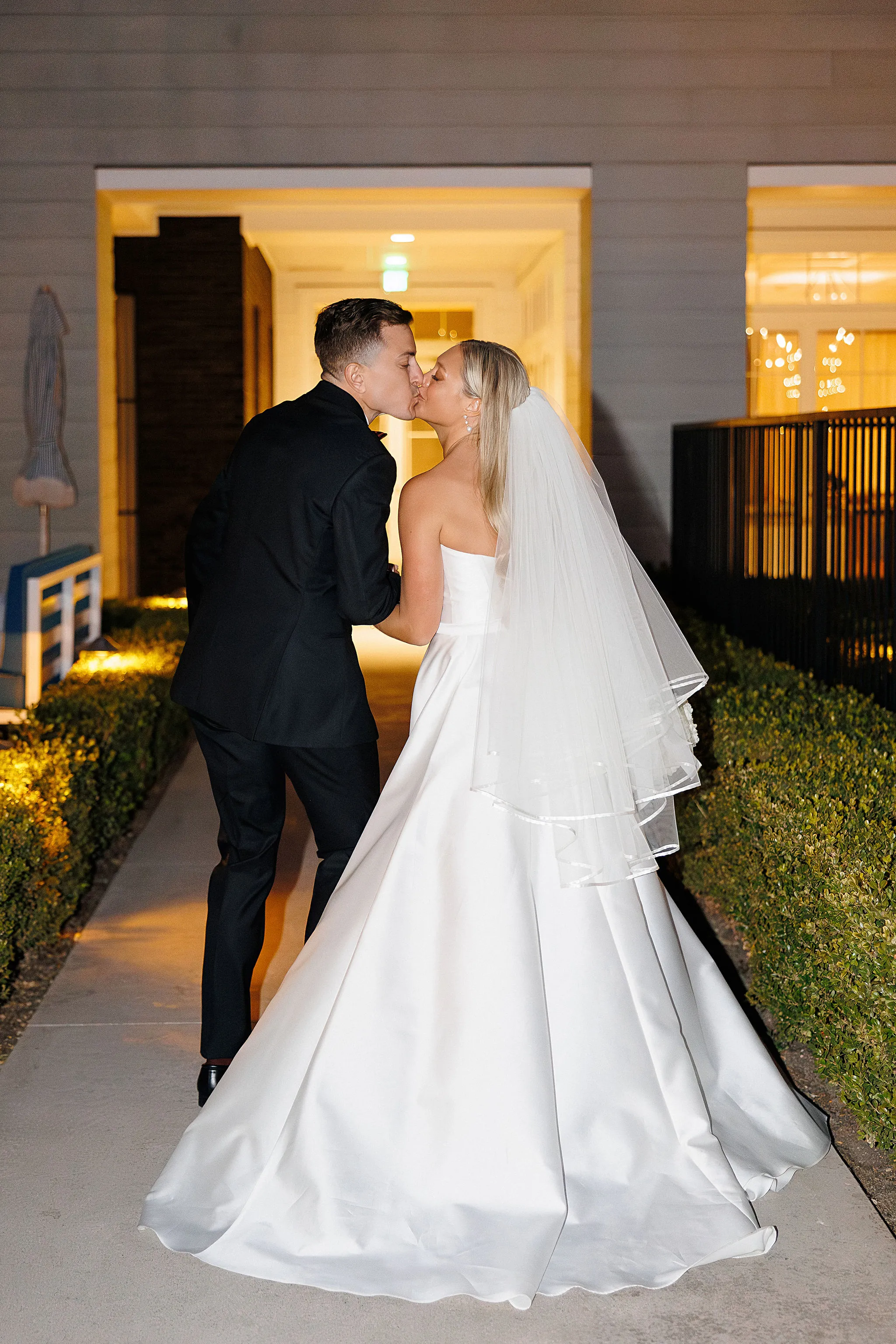 bride and groom kissing at Lido House