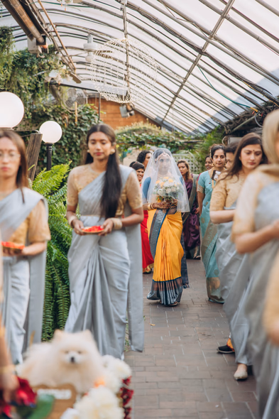 Guests arriving for Tamil Hindu wedding at greenhouse wedding venue Ontario