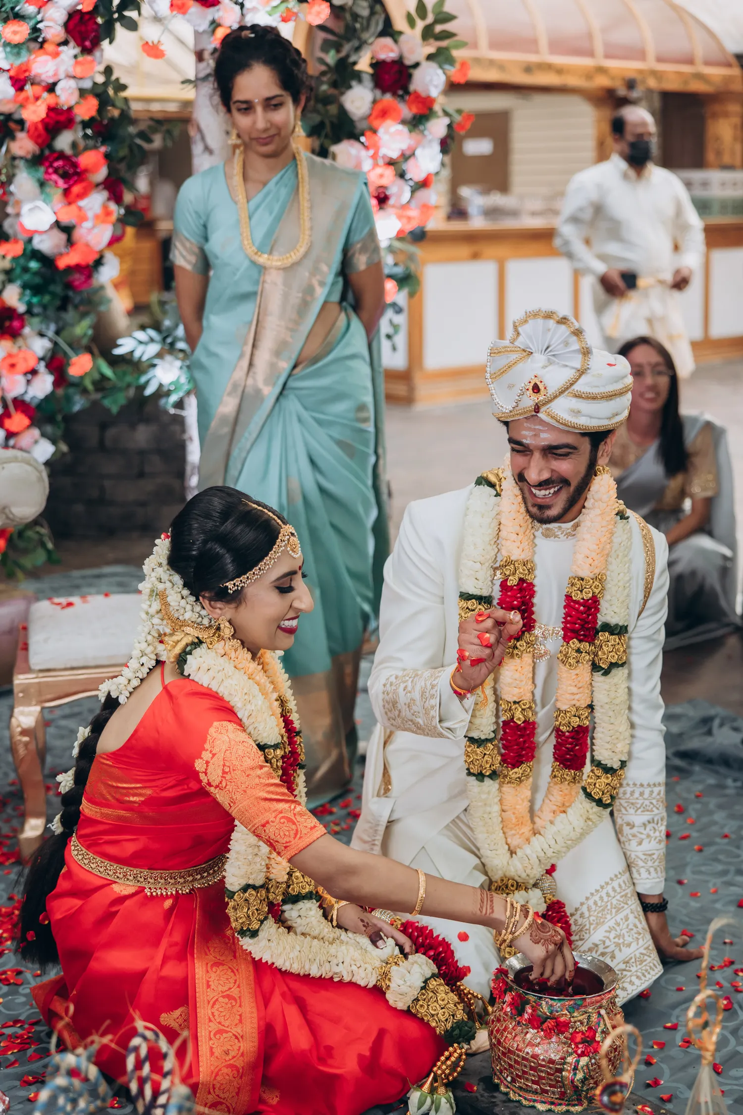 Sacred water ritual at Tamil outdoor wedding, Madison Greenhouse wedding photos