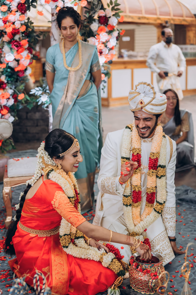 Sacred water ritual at Tamil outdoor wedding, Madison Greenhouse wedding photos