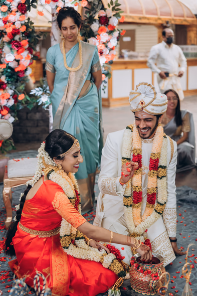 Sacred water ritual at Tamil outdoor wedding, Madison Greenhouse wedding photos