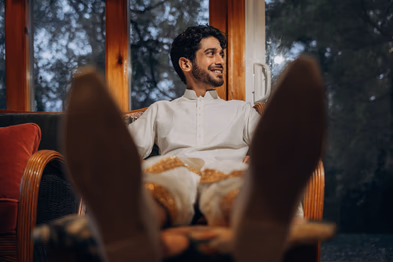 Groom relaxing before Tamil Hindu wedding at Madison Greenhouse venue