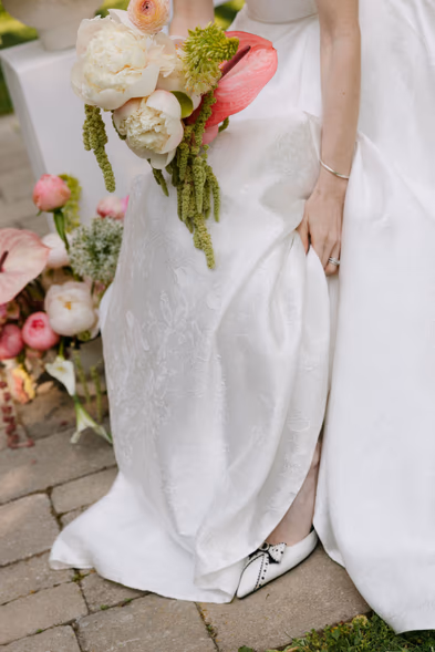 bridal dress and bouquet detail soft editorial wedding photography Queen’s Landing