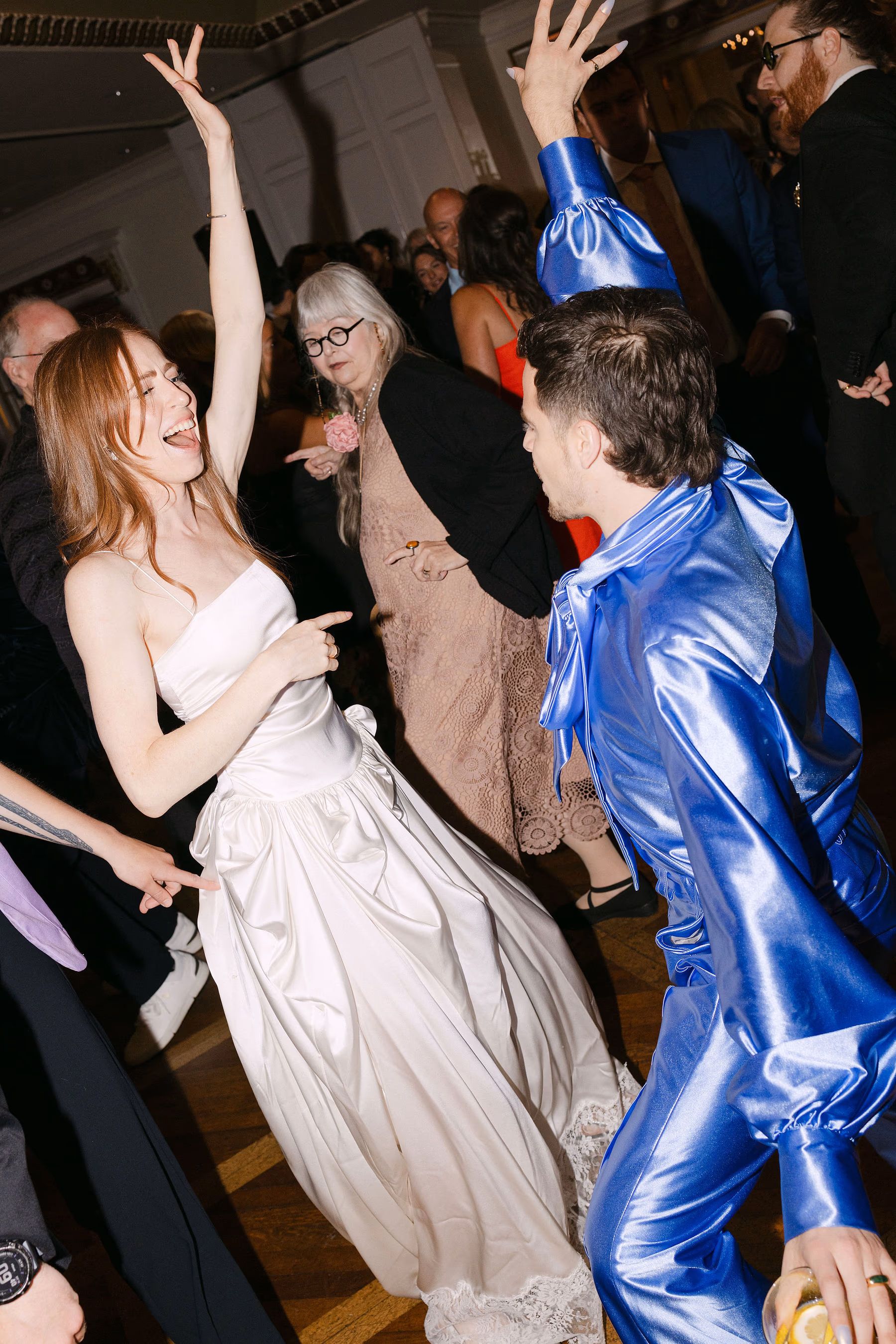 dance floor party guests energetic reception moment wedding celebration