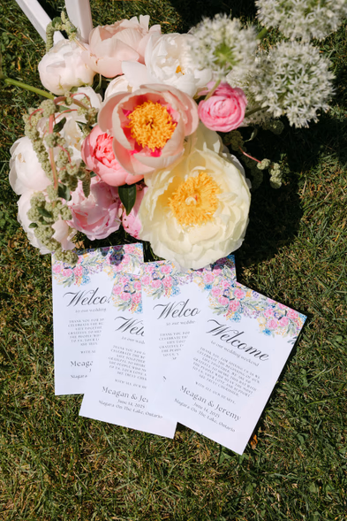 wedding invitation suite and bridal bouquet flat lay Queen’s Landing Niagara-on-the-Lake wedding photography