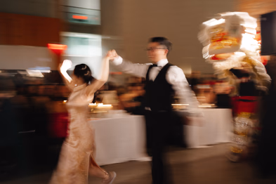 lion dancers enter ricardas atrium wedding reception