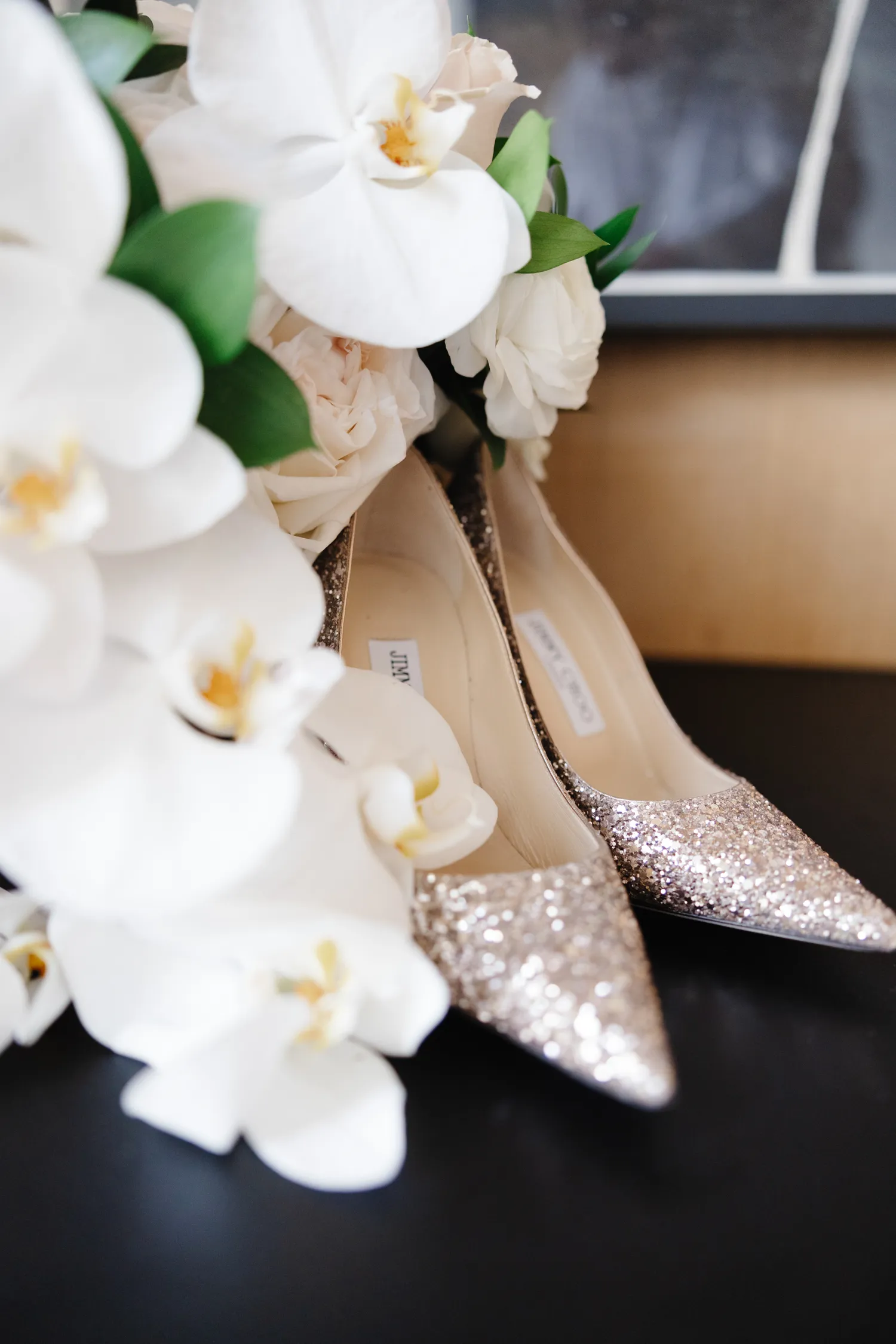 Heels and orchids flat lay