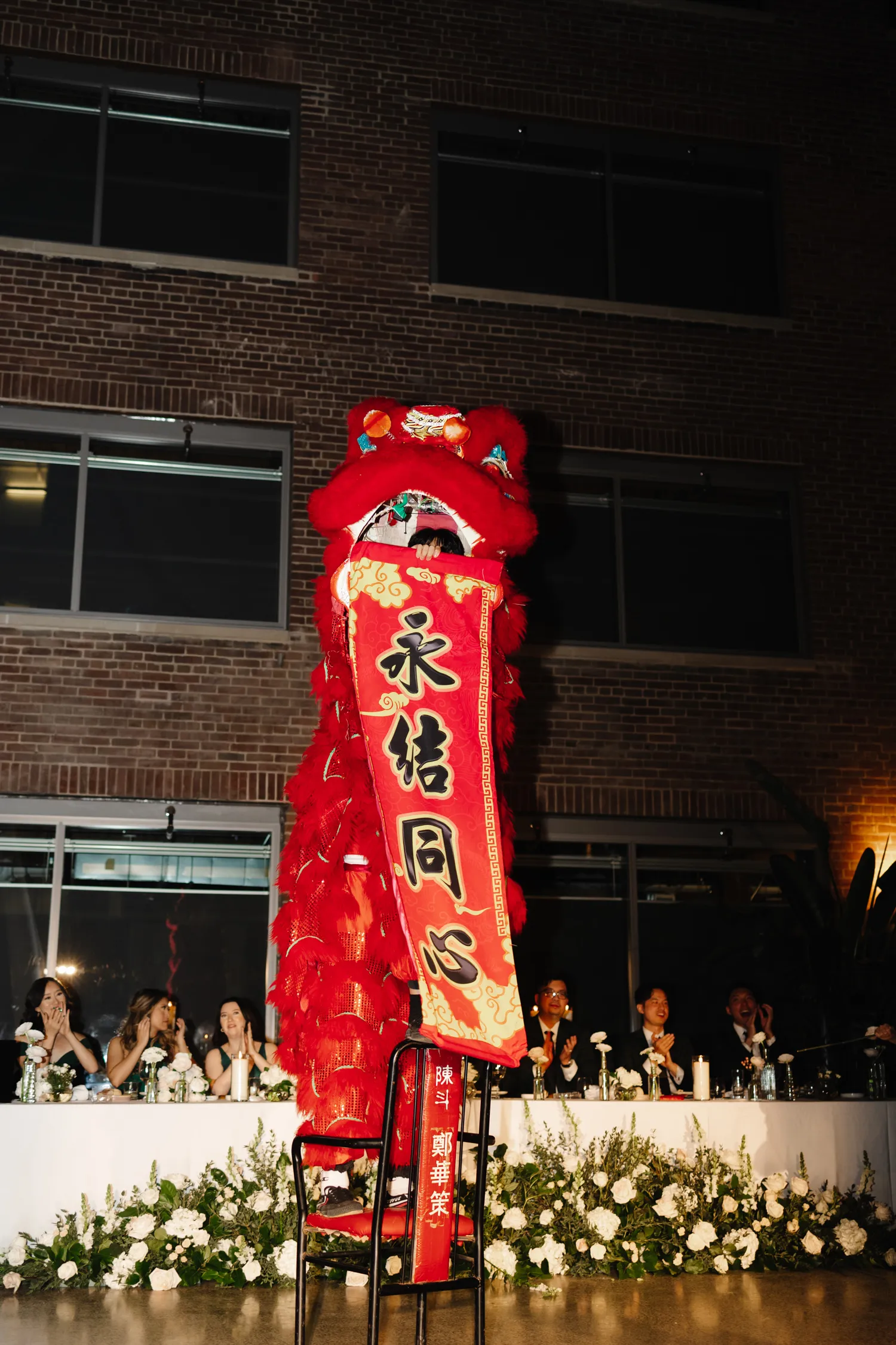 lion dancers at ricardas atrium toronto