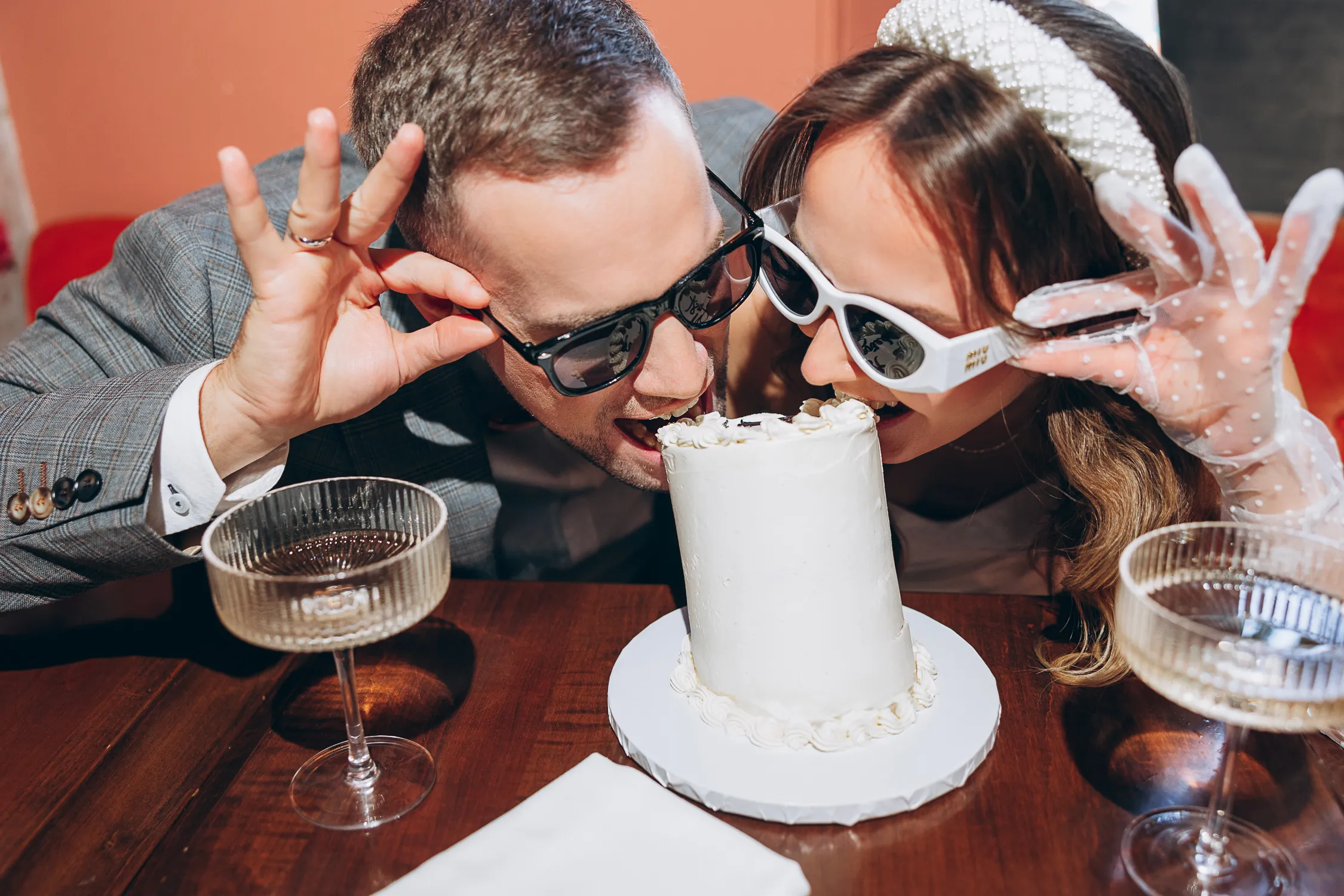 cake cutting at wedding photoshoot