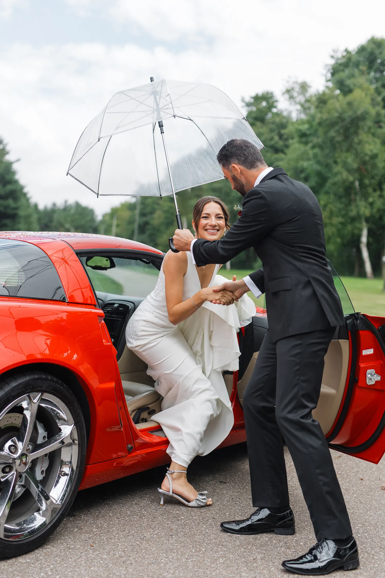 bride and groom with retro car