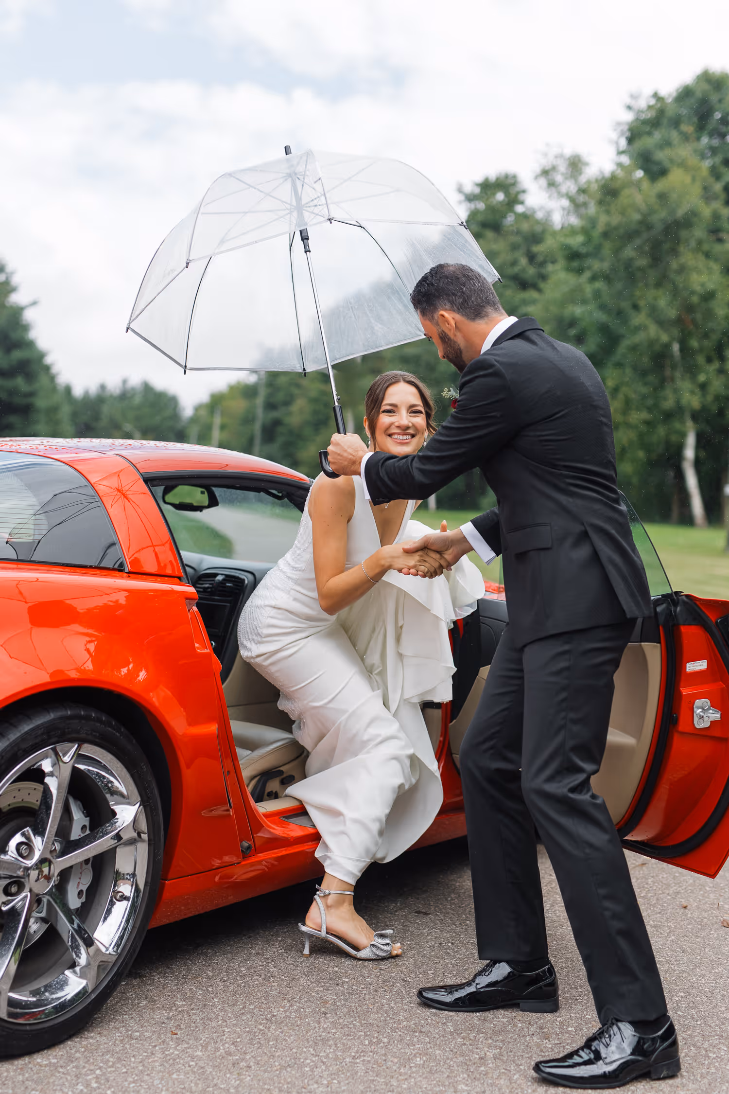 bride and groom with retro car